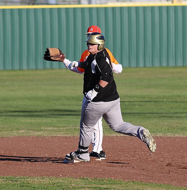 Image: Gladiator John Byers hits his first of three doubles on the day against the Eagles.