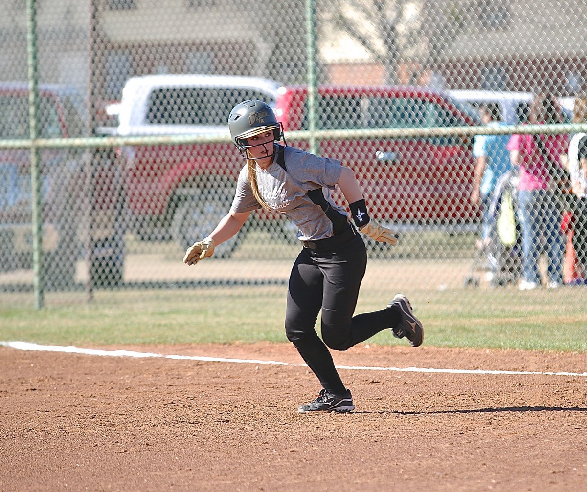 Image: Lady Gladiator Bailey Eubank(1) hustles over to second-base.