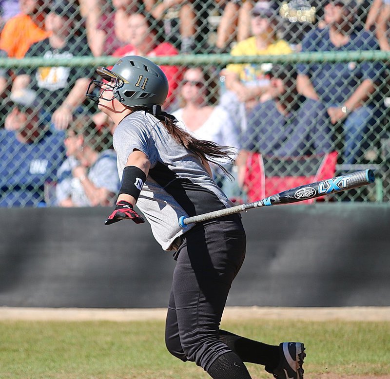 Image: Italy’s Jenna Holden(11) sends a shot into Palmer’s outfield.