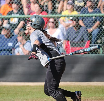 Image: Italy’s Jenna Holden(11) sends a shot into Palmer’s outfield.