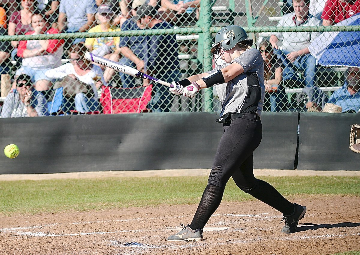 Image: Italy slugger Jaclynn Lewis(15) drives the ball past Palmer’s infielders.