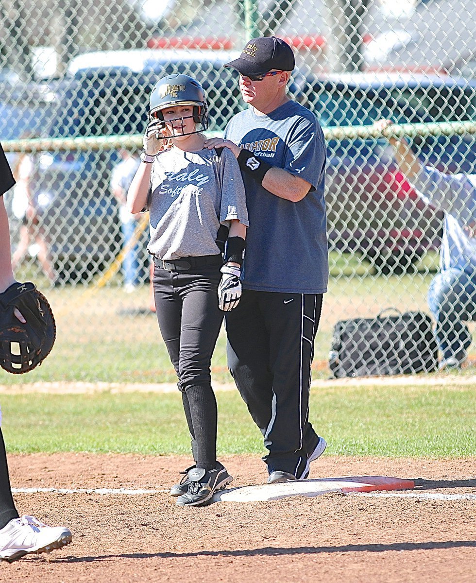 Image: Father/coach Michael Chambers gives daughter/player Britney Chambers words of encouragement.