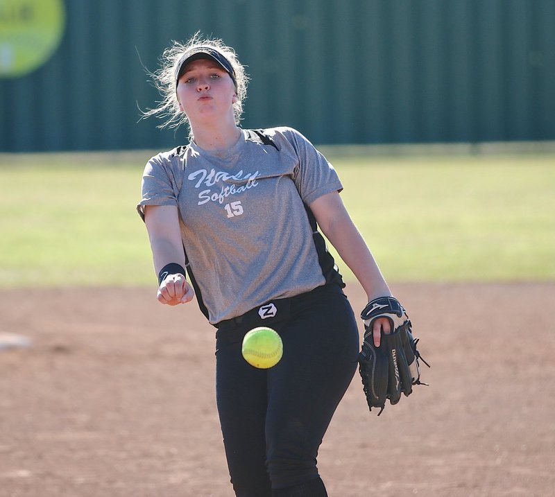Image: Jaclynn Lewis(15) finishes off Palmer for a 12-1 Lady Gladiator victory.