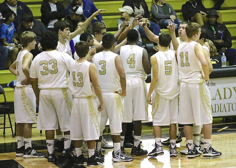 Image: The JV Gladiators break the huddle after some advice from head coach Bobby Campbell.