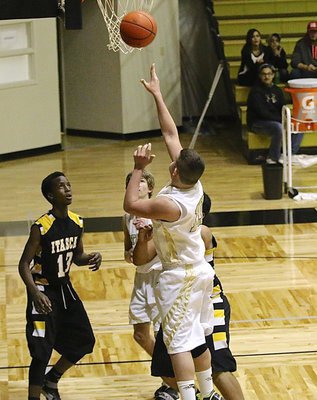 Image: JV Gladiator Austin Crawford(10) ties up the game 35-35 after getting a rebound and going back up with the ball. Unfortunately for the old gold and white, Itasca would make a free-throw after time expired to defeat Italy 36-35 in a thriller.