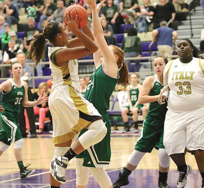 Image: Italy’s Emmy Cunningham(3) is fouled by Santo while driving to the basket.