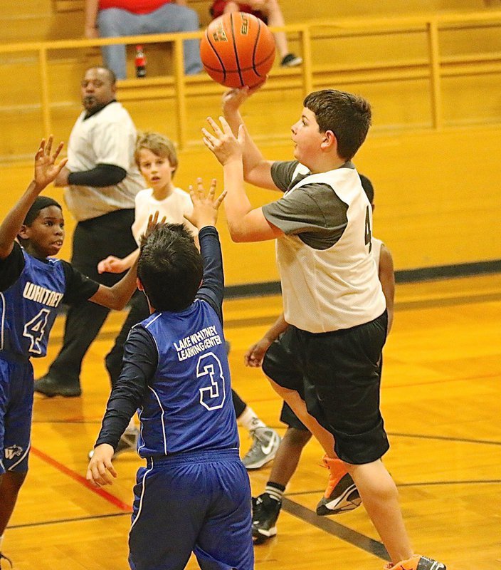 Image: Gage Wafer(4) turns into the paint and scores with the one-hander for 2 of his 8-points.