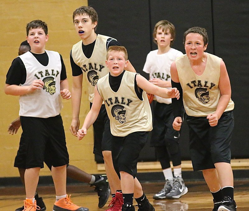 Image: Everybody checks the clock after Italy Gold’s Grant Hamby(9) scored to tie the game 26-26. Teammates Ty Cash(10) and Jayden Saxon(8) celebrate their team’s comeback effort that tied the game 26-26.