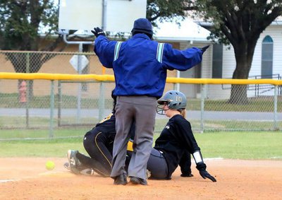 Image: Safe! Madison Washington is safe at third after an aggressive slide to help jar the ball loose against Hubbard.