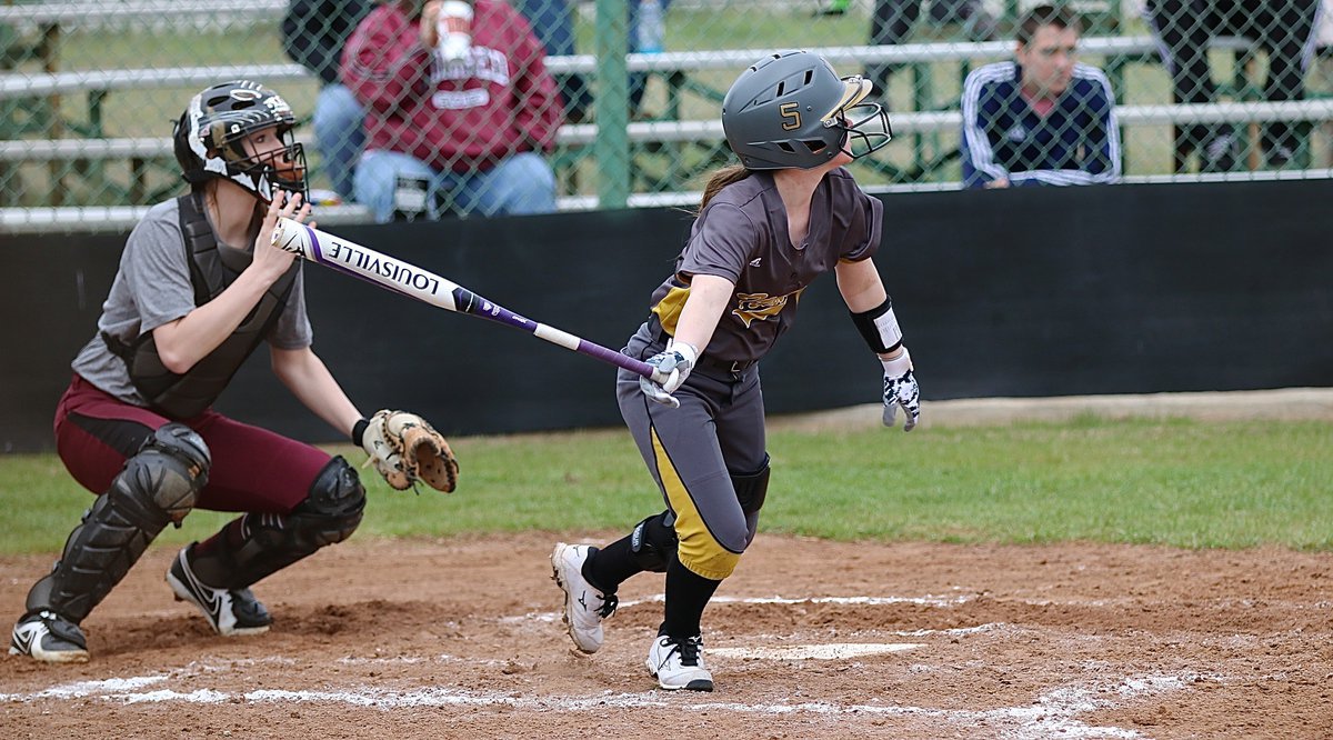 Image: Lady Gladiator senior Tara Wallis(5) says, “Thank you very much,” as she lofts one up and over Mildred’s infield.