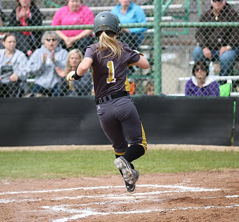 Image: Bailey Eubank(1) scores the first run for Italy to get the Lady Gladiators on the board against Mildred.