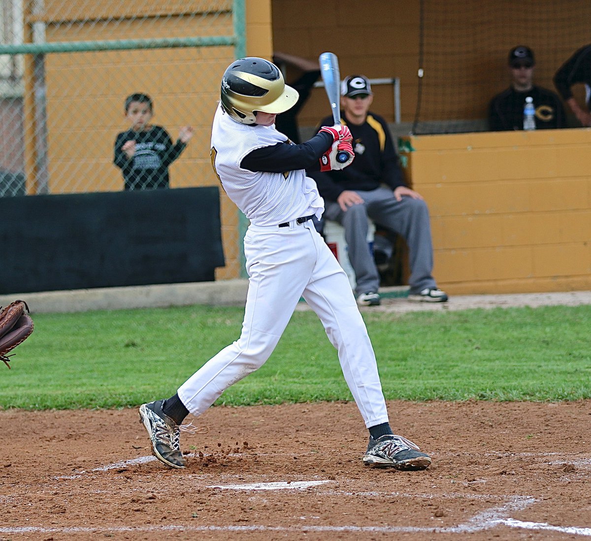 Image: Reese Janek hits one into the outfield for Italy’s JV.