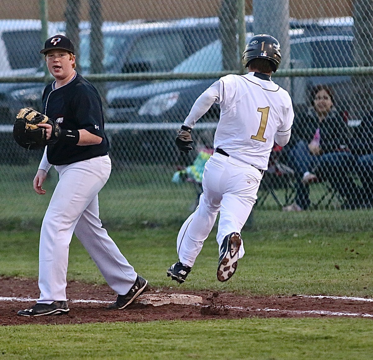 Image: Leadoff hitter Levi McBride(1) gets on base first for Italy. McBride would steal both second and third-base before a balk by the Eagle pitcher sent him home to give the Gladiators a 1-0 lead early.