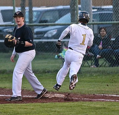 Image: Leadoff hitter Levi McBride(1) gets on base first for Italy. McBride would steal both second and third-base before a balk by the Eagle pitcher sent him home to give the Gladiators a 1-0 lead early.