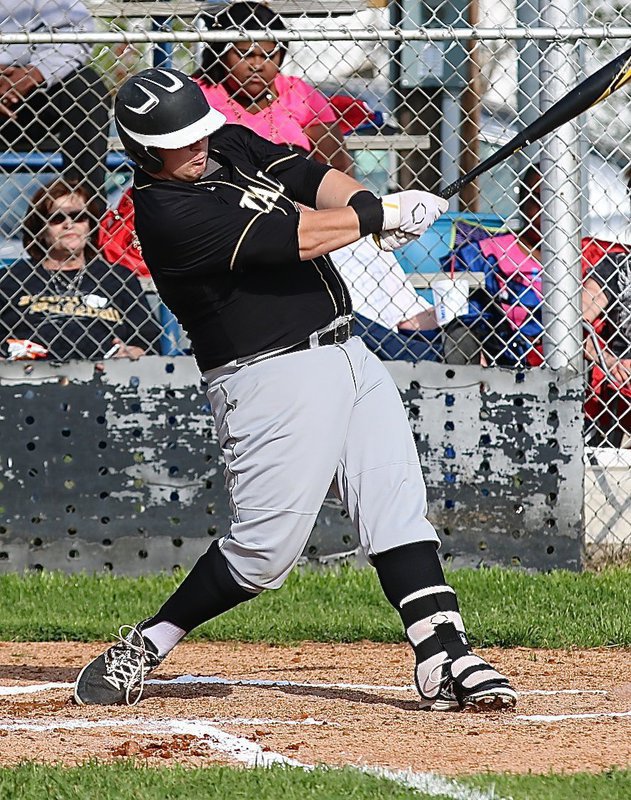 Image: Senior slugger John Byers(18) connects on a Polar Bear pitch.