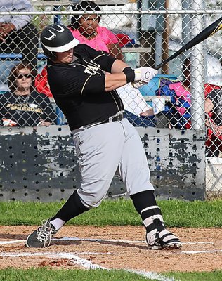 Image: Senior slugger John Byers(18) connects on a Polar Bear pitch.