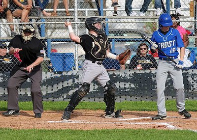 Image: Gladiator catcher John Escamilla(7) pulls in a strike three pitch from his pitcher Ryan Connor.