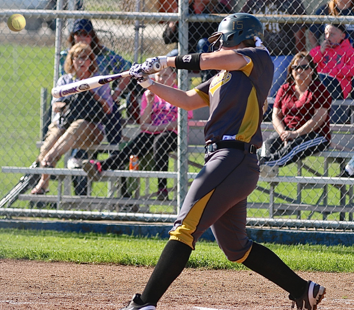 Image: Italy’s Jaclynn Lewis(15) connects for her first over-the-fence homer against Frost.