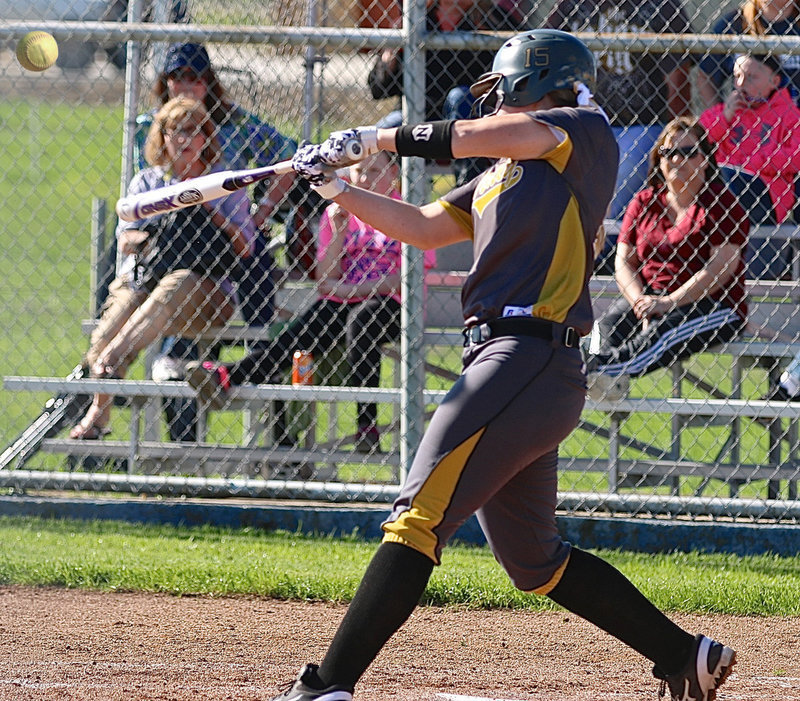Image: Italy’s Jaclynn Lewis(15) connects for her first over-the-fence homer against Frost.
