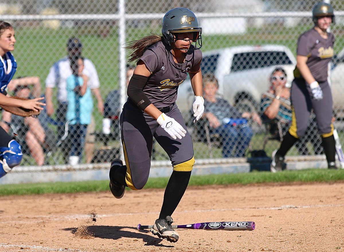 Image: Lady Gladiator April Lusk(7) doing what she does and doing it very well.