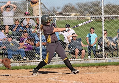 Image: Oops! She did it again!! Jaclynn Lewis(15) sends her second homer over the left field fence against Frost.