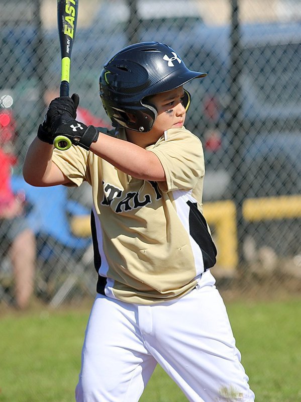 Image: Italy’s Hagan Carr looks confident while at bat during IYAA Baseball/Softball Opening Day at Upchurch Ballpark.