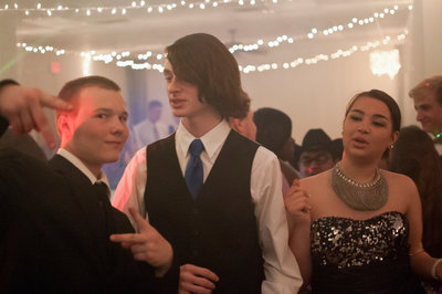 Image: Brandon Skaggs, Damon Murdock, and Heaven-Lea Bossu-Browne enjoy the evening