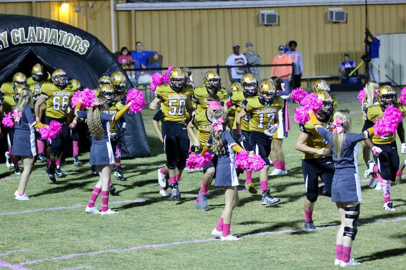 Image: Here come the Gladiators as they charge on to Willis Field to take on the Chilton Pirates.