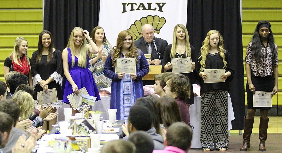 Image: Coach Johnny Jones recognizes the JV Girls Cross-Country team, which consisted of: Britney Chambers, Ashlyn Jacinto, Hannah Washington, Reagan Jones, Brooke DeBorde, Brycelen Richards and Janae Robertson.