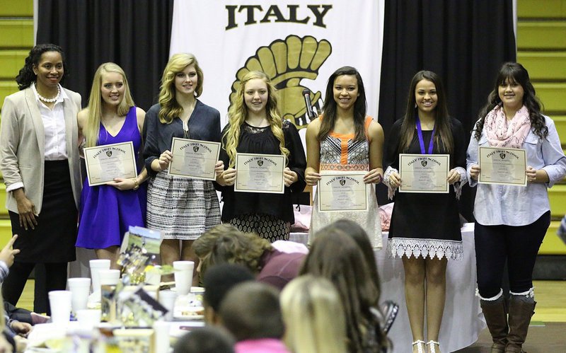 Image: Coach Laquita Walker presents All-District Awards to volleyball team members Hannah Washington, Halee Turner, Brycelen Jacinto, April Lusk, Ashlyn Jacinto and Jenna Holden.