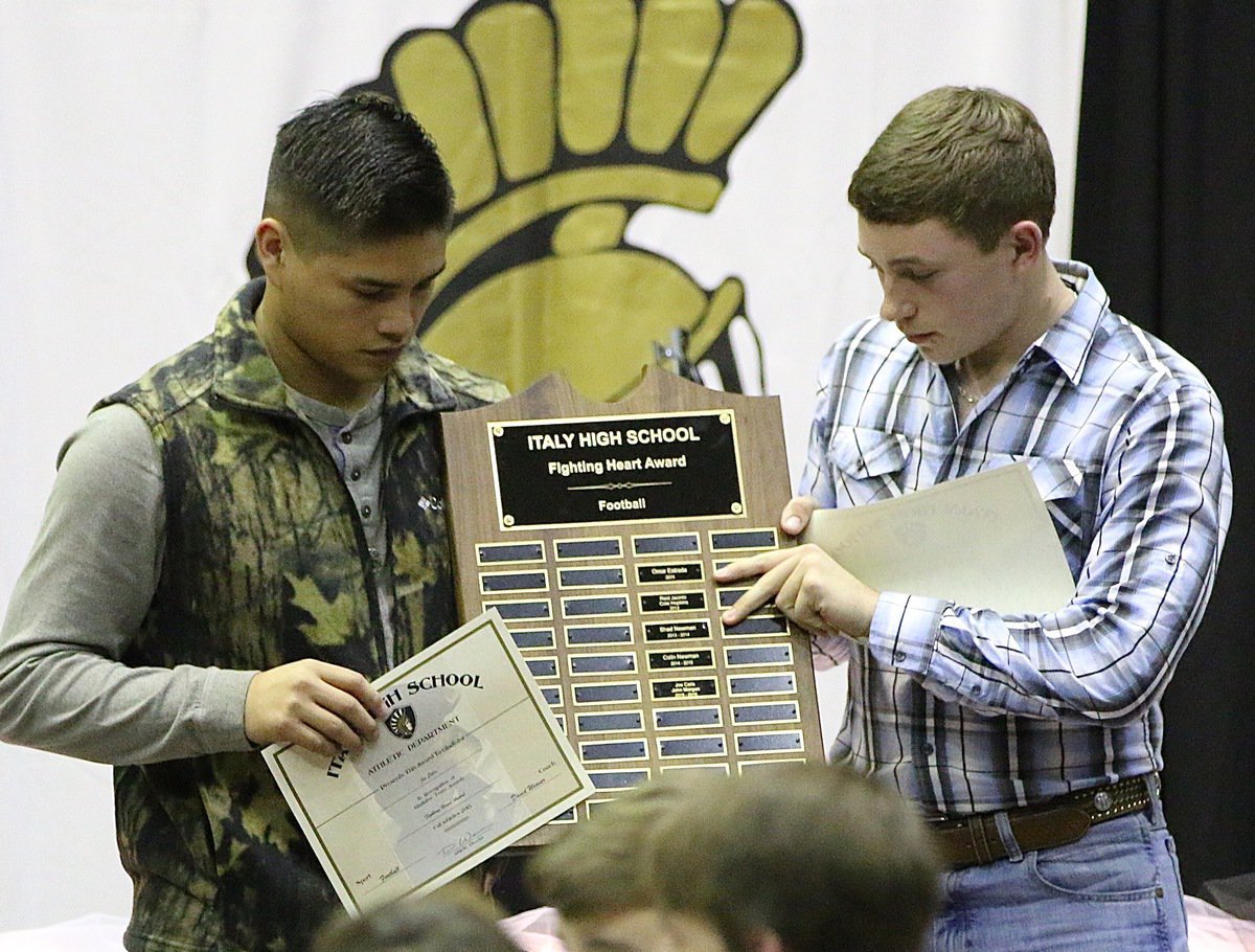 Image: Joe Celis and John Morgan share the Italy Gladiator Football Fighting Heart Award.