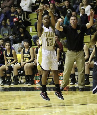 Image: Italy Lady Gladiator DeCorea Green (13) feels right at home in the dome while scoring 12-points against visiting Itasca.