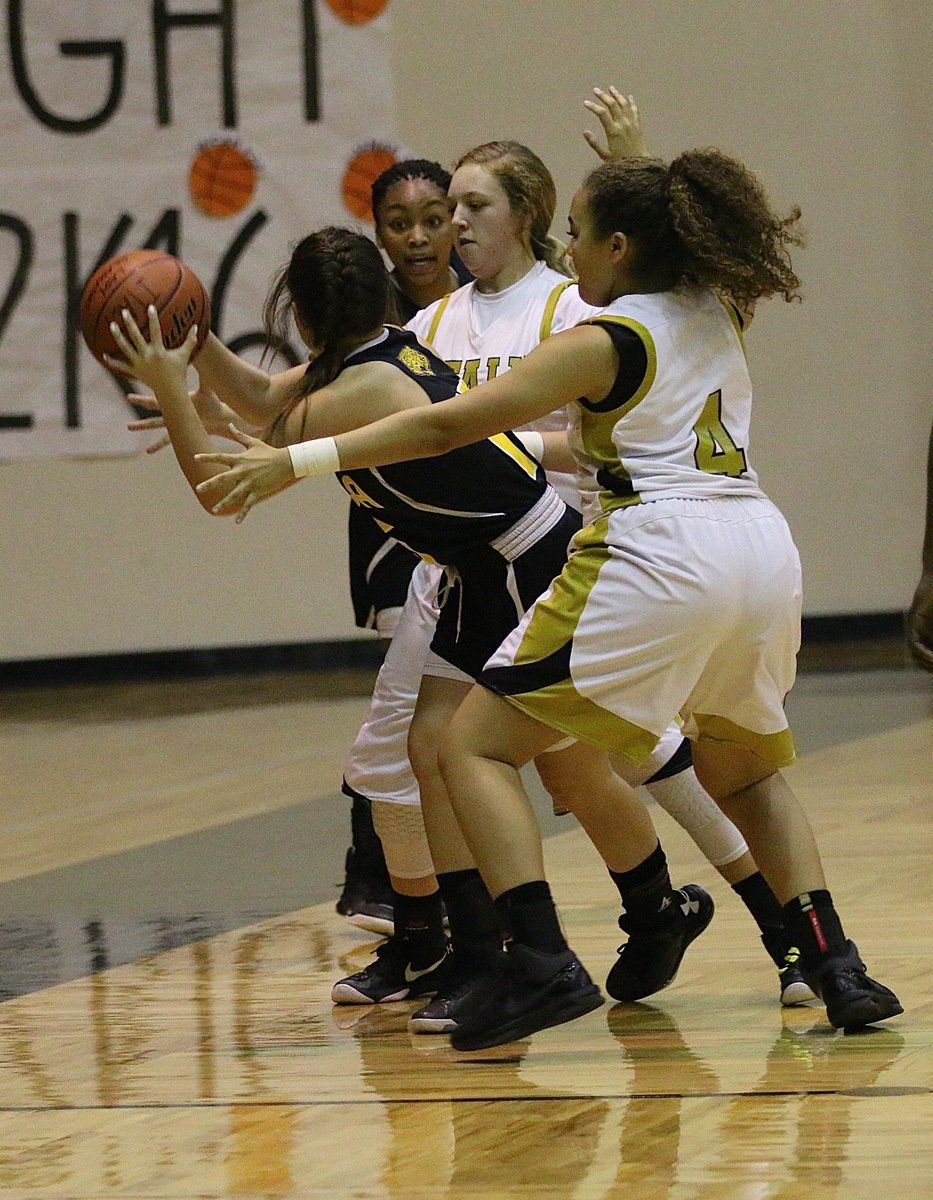 Image: Italy’s Vanessa Cantu(4) and teammate Brycelen Richards(11) converge on an Itasca ball handler during the JV Girls game.