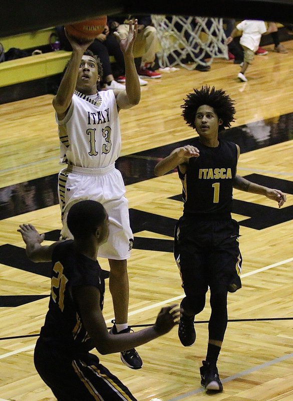 Image: Keith Davis, Jr. (13) led the Italy Gladiators with a 35-point performance during a 77-56 home win over the Itasca Wampus Cats. Davis dropped in six 3-pointers on the night.