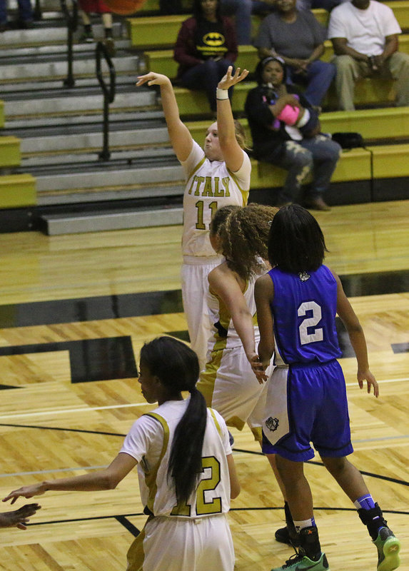 Image: Lady Gladiator Vanessa Cantu(4) shields a Milford defender as Brycelen Richards(11) steps up to knock down a jumper during Italy’s playoff tuneup game against the visiting Lady Bulldogs.