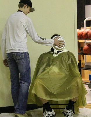 Image: At halftime, Senior Clayton Miller, Italy Gladiator Football’s 2016 Team MVP, applies a pie in the face to AD/HFC David Weaver as a fundraiser for the Gladiator Athletic Booster Club.