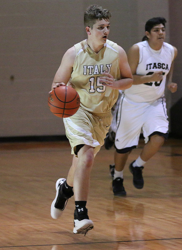 Image: Italy JV Gladiator James Walton(15), the big man, shows his dribbling skills while controlling the ball.
