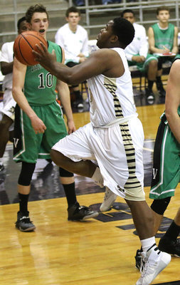 Image: Gladiator Kenneth Norwood(3) scores a layup in the second-period after creating the turnover on the defensive end.
