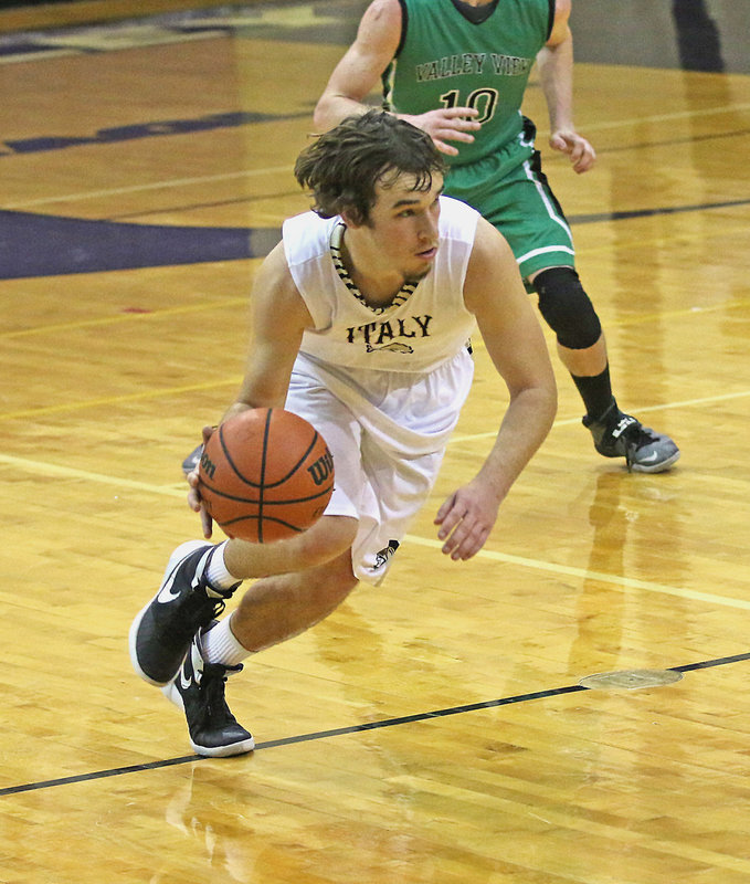 Image: Ryan Connor(2) steals the ball away from the Eagles and hurries down the court to score the layup. Connor also hit a three-pointer in the second-half to finish with 5-points.