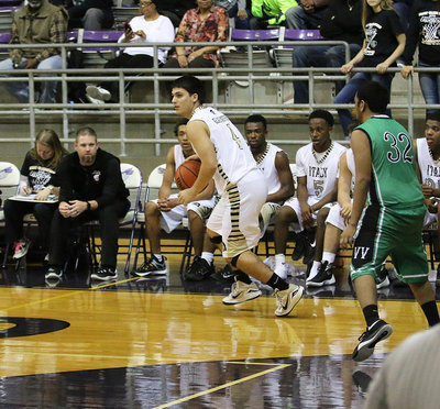 Image: Italy’s Mason Womack(4) dribbles down some clock in the final seconds with the Gladiators putting the final touches on their playoff win.