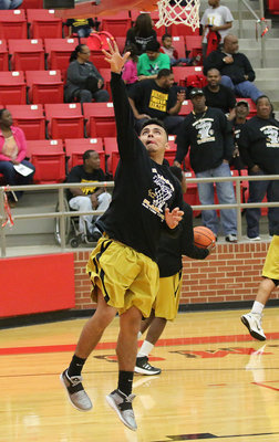 Image: Italy Gladiator senior Jorge Galvan warms up during the area playoff matchup against Petrolia. Galvan made the Academic All-District list for the 2015-2016 season in District 12-2A.