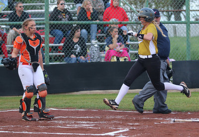 Image: Italy is on another level as Lady Gladiator senior Hannah Washington flies in for a run against the Lady Eagles.