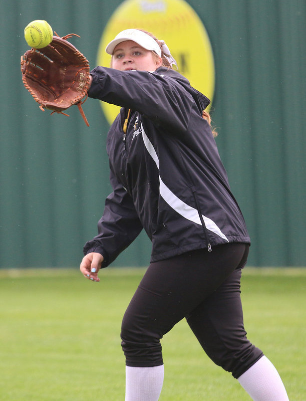 Image: Italy Lady Gladiator Raegan Jones snags a popup during pregame warmups.