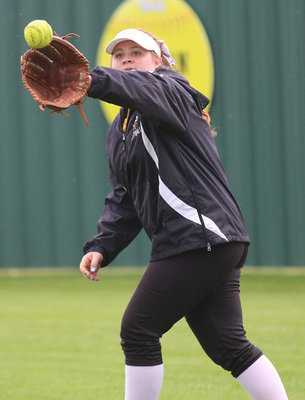 Image: Italy Lady Gladiator Raegan Jones snags a popup during pregame warmups.