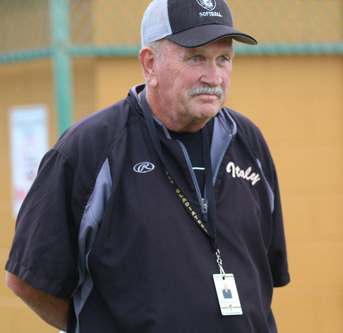 Image: Italy assistant head coach Johnny Jones monitors his players during pregame warmups before the start of their game against Avalon.