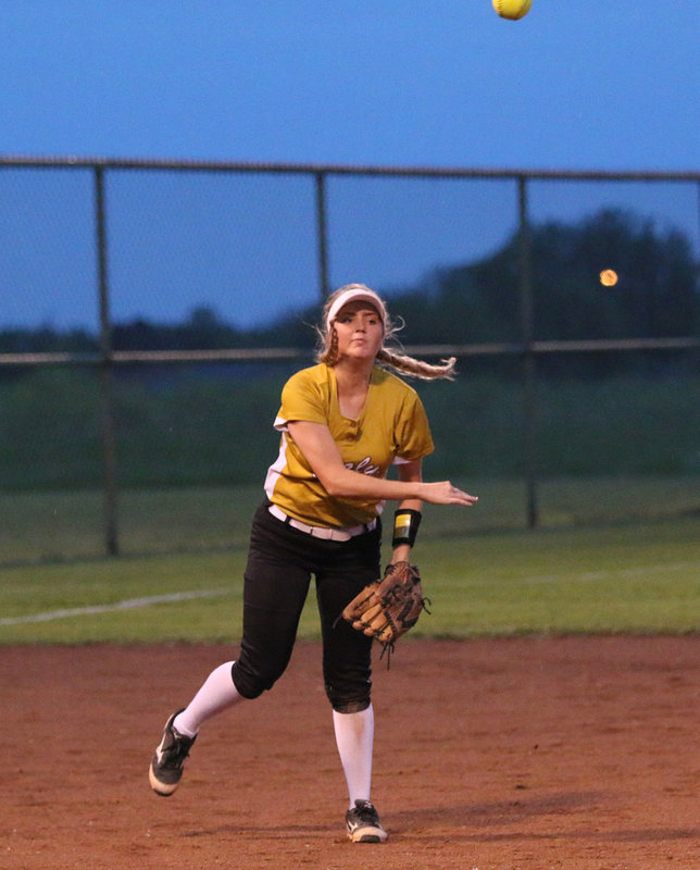 Image: Italy third-baseman Hannah Washington catches a popup and then catches an Avalon runner before she can get back to first-base, completing the double-play.