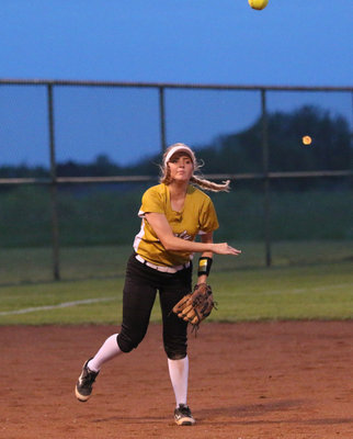 Image: Italy third-baseman Hannah Washington catches a popup and then catches an Avalon runner before she can get back to first-base, completing the double-play.