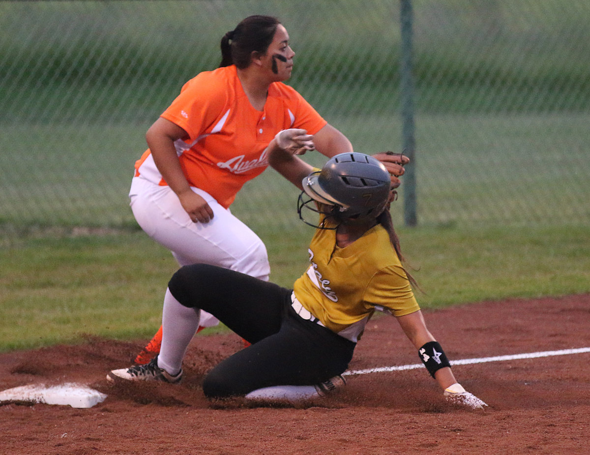 Image: Italy’s April Lusk has the wheels to steal third-base but now tries to slam on the breaks.