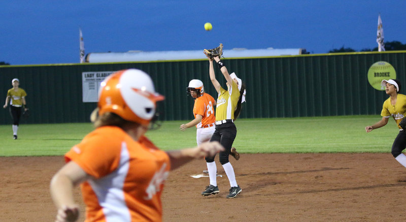 Image: Senior second-baseman Cassidy Childers gets under this popup to setup Italy’s game clinching final at bat.