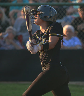 Image: Italy’s April Lusk(7) gets on base with a fly ball against Covington.